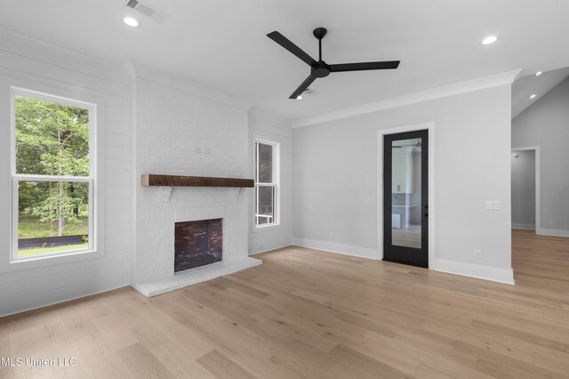 231 Oakside Trl, Madison, MS 39110 - unfurnished living room with a ceiling fan, wood finished floors, a brick fireplace, recessed lighting, and ornamental molding
