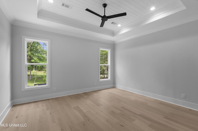 231 Oakside Trl, Madison, MS 39110 - empty room with a raised ceiling, light wood finished floors, a ceiling fan, baseboards, and recessed lighting