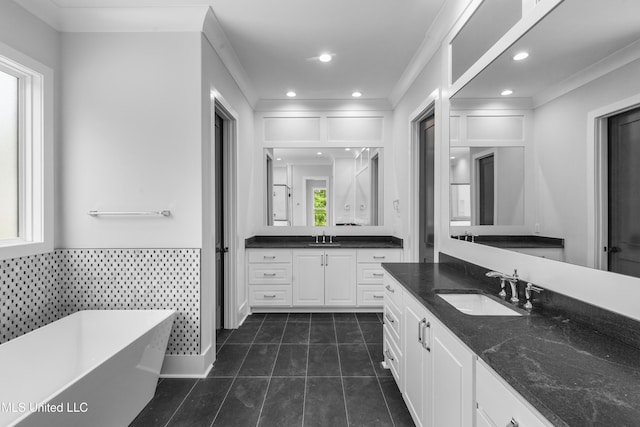 231 Oakside Trl, Madison, MS 39110 - full bath with tile patterned flooring, recessed lighting, a freestanding bath, and two vanities