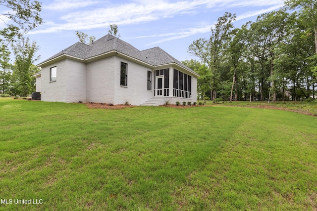 231 Oakside Trl, Madison, MS 39110 - back of house with a sunroom, a lawn, and central air condition unit