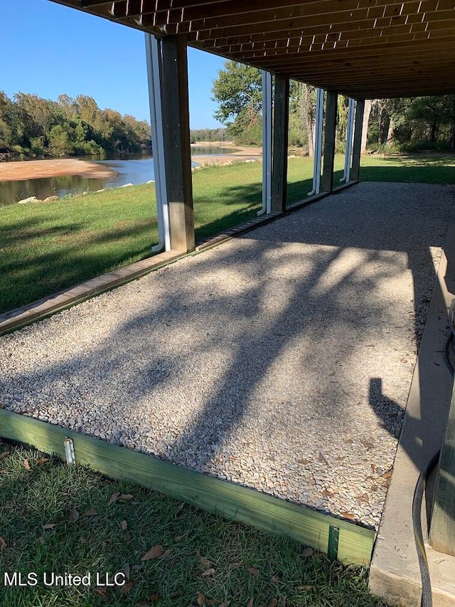 view of patio / terrace with a water view