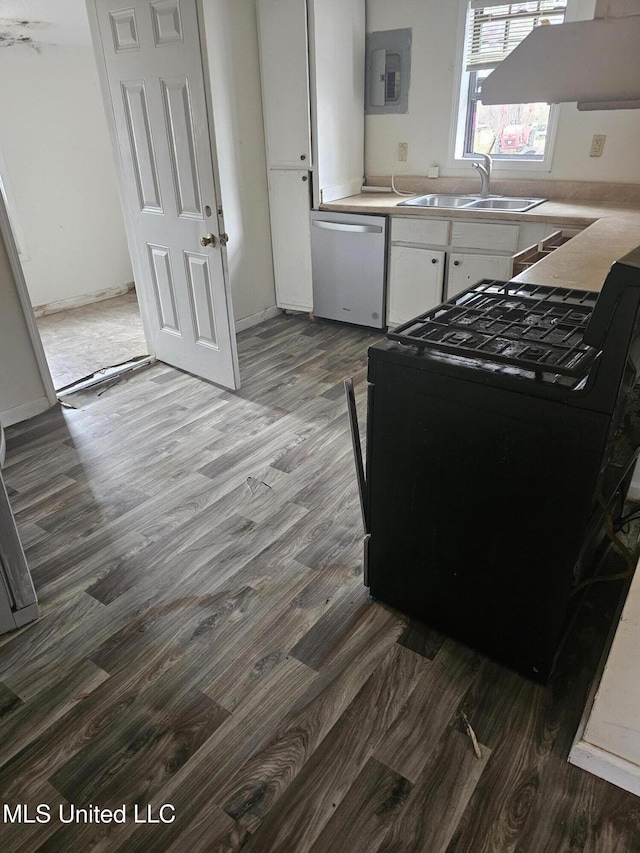 219 W St, Batesville, MS 38606 - kitchen with dishwasher, light countertops, black range with gas stovetop, and a sink