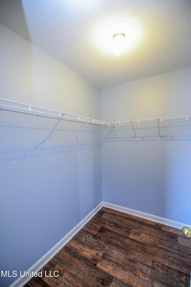 796 Steward Ln, Southaven, MS 38671 - spacious closet with dark wood-type flooring