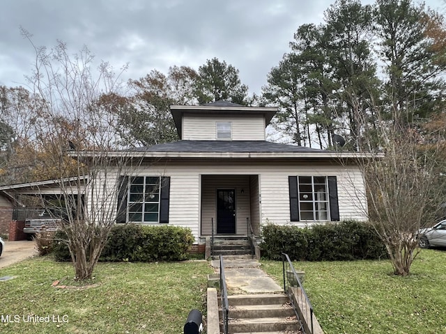 view of front of house with a front yard