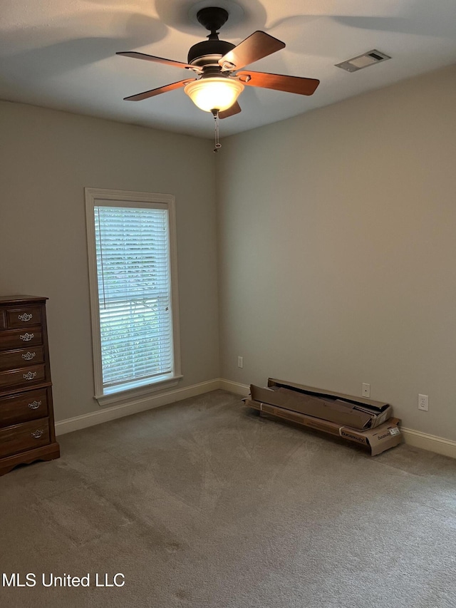 interior space featuring ceiling fan