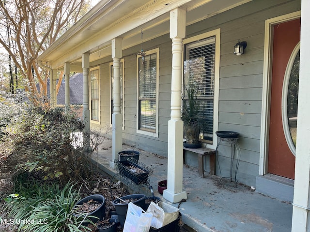 doorway to property with a porch