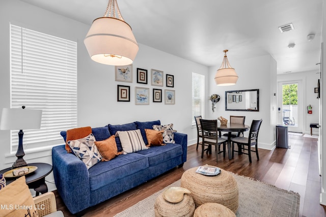 2207 Government St Unit 15, Ocean Springs, MS 39564 - living room with wood finished floors and baseboards