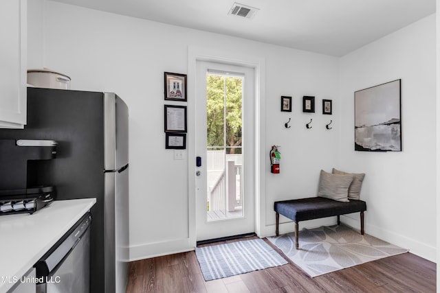 2207 Government St Unit 15, Ocean Springs, MS 39564 - doorway featuring dark wood finished floors and baseboards