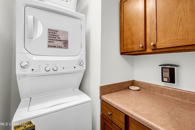 2207 Government St Unit 15, Ocean Springs, MS 39564 - laundry room with stacked washer / dryer