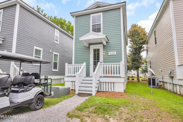 2207 Government St Unit 15, Ocean Springs, MS 39564 - view of front of home with central AC and a front lawn