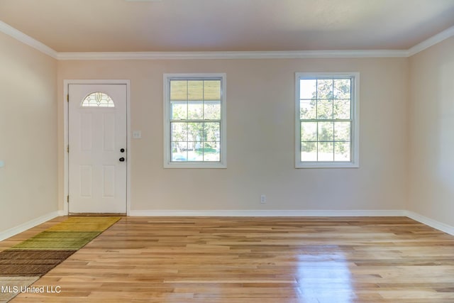 258 Porter Ave, Biloxi, MS 39530 - entrance foyer featuring wood finished floors, crown molding, and baseboards