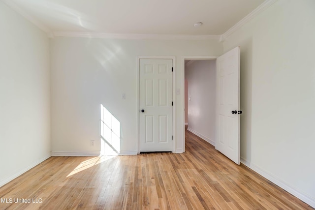 258 Porter Ave, Biloxi, MS 39530 - spare room with light wood finished floors, baseboards, and ornamental molding