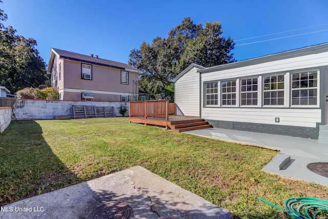 view of yard with a deck