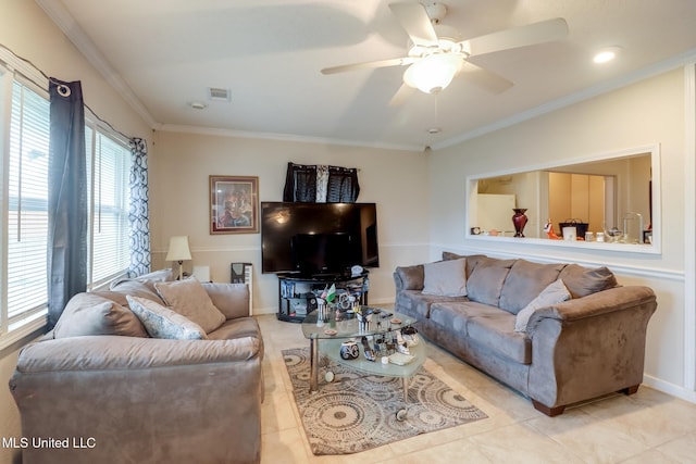 living room featuring crown molding, light tile patterned floors, and ceiling fan