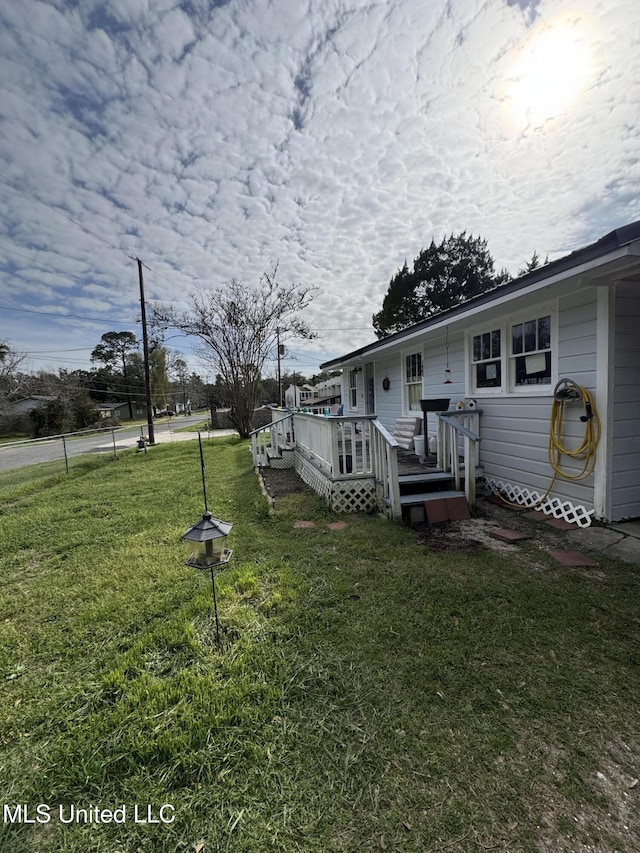 view of yard with a deck