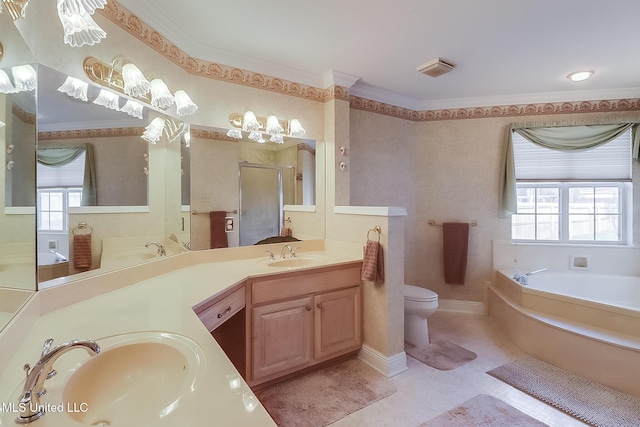 bathroom featuring a bath, double vanity, ornamental molding, and a sink