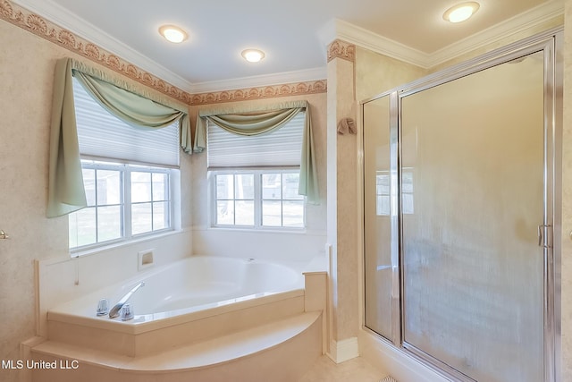 bathroom with a garden tub, a shower stall, and crown molding