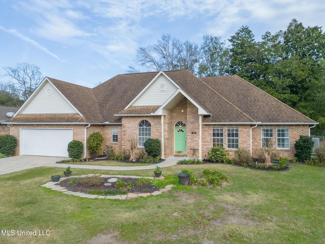 view of front of house featuring brick siding, a shingled roof, concrete driveway, an attached garage, and a front yard