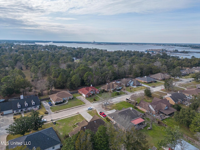 aerial view featuring a water view and a residential view