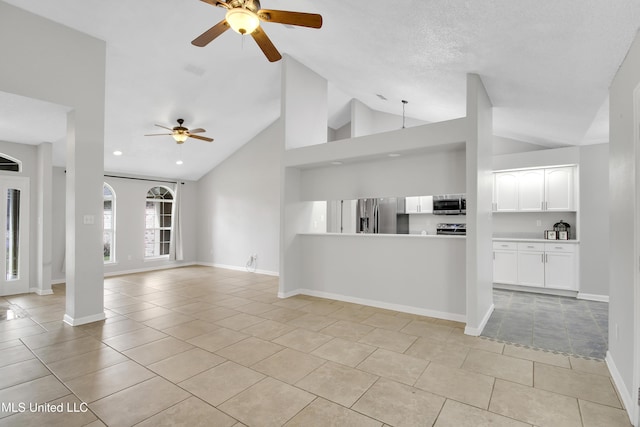 unfurnished living room with recessed lighting, light tile patterned flooring, a ceiling fan, and baseboards