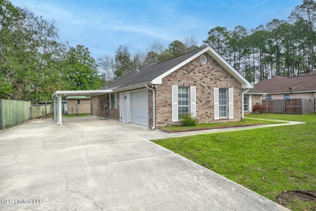 ranch-style house with a carport, fence, a front yard, and driveway