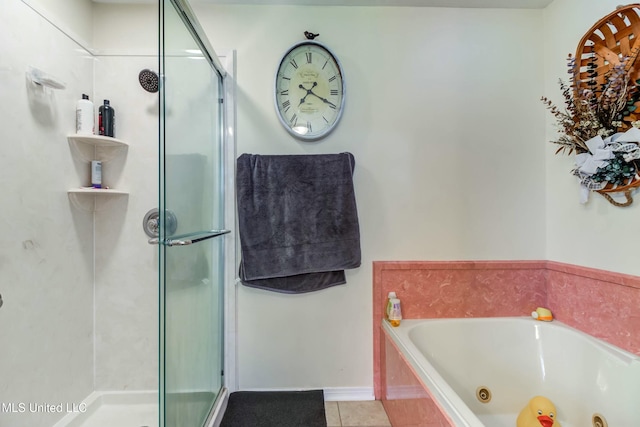 bathroom with tile patterned floors and plus walk in shower