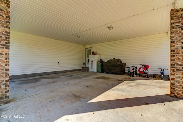 view of patio featuring a carport