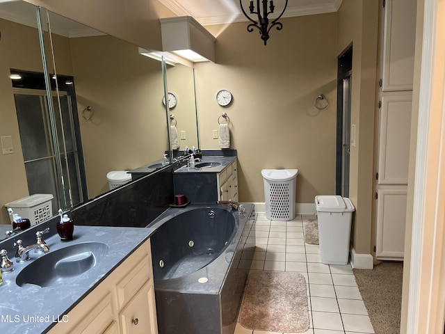 420 Fox Bay Dr, Brandon, MS 39047 - full bath featuring crown molding, a jetted tub, vanity, tile patterned flooring, and baseboards