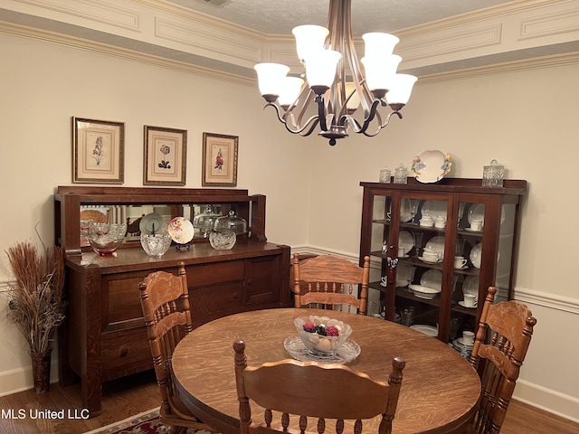 420 Fox Bay Dr, Brandon, MS 39047 - dining space with a chandelier, wood finished floors, baseboards, and crown molding