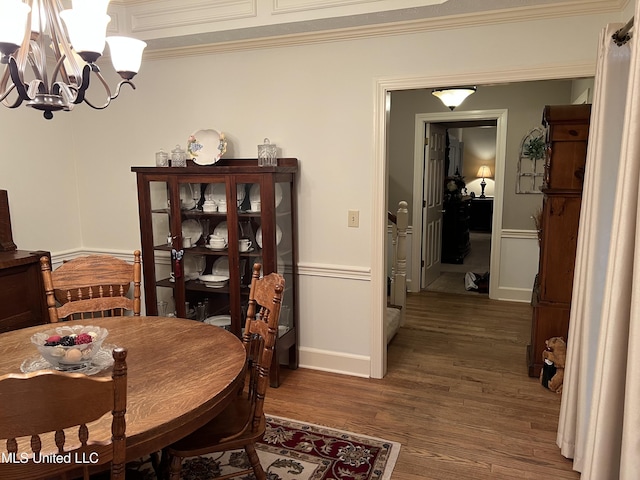 420 Fox Bay Dr, Brandon, MS 39047 - dining space with a chandelier, dark wood-style flooring, baseboards, and crown molding