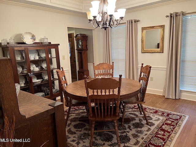420 Fox Bay Dr, Brandon, MS 39047 - dining space featuring a chandelier, crown molding, and wood finished floors