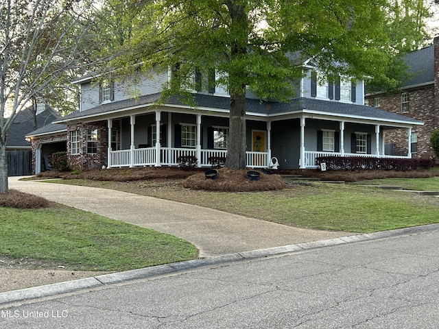 420 Fox Bay Dr, Brandon, MS 39047 - farmhouse inspired home with covered porch, a front yard, and a garage