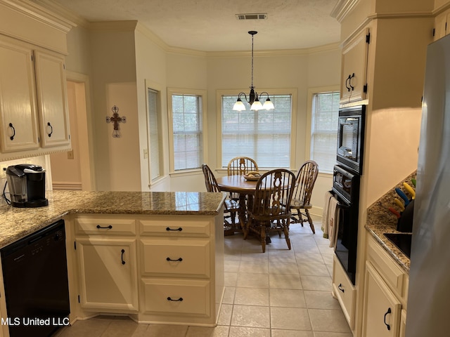 420 Fox Bay Dr, Brandon, MS 39047 - kitchen featuring black appliances, a chandelier, a peninsula, light tile patterned flooring, and white cabinetry