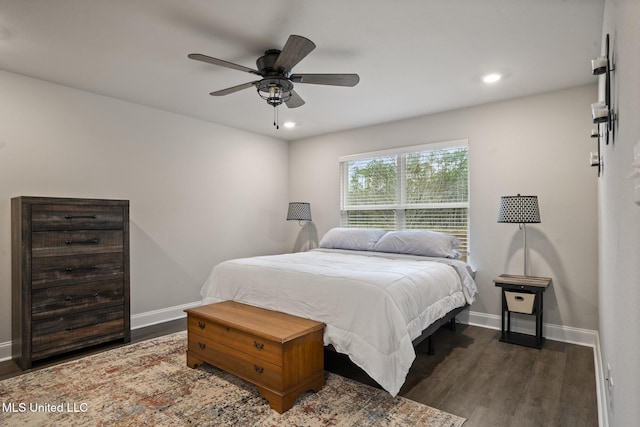 bedroom featuring a ceiling fan, recessed lighting, dark wood-style flooring, and baseboards