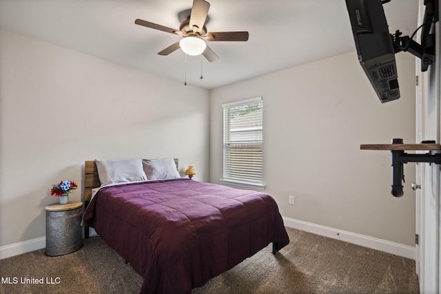 bedroom with a ceiling fan, carpet, and baseboards