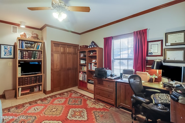 tiled home office featuring ceiling fan and ornamental molding