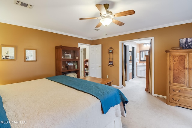 carpeted bedroom featuring ensuite bathroom, ceiling fan, and ornamental molding