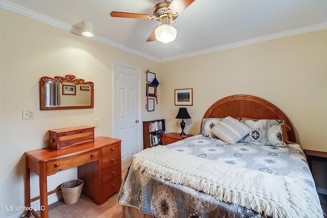 carpeted bedroom featuring ceiling fan and ornamental molding