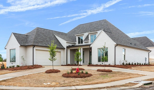 753 Northridge Trl, Brandon, MS 39047 - view of front of home featuring a shingled roof, brick siding, driveway, and a garage