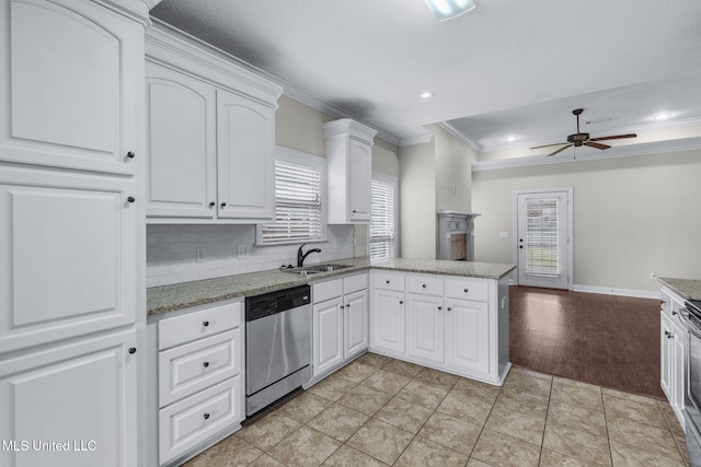 kitchen with ornamental molding, white cabinetry, a sink, dishwasher, and a peninsula