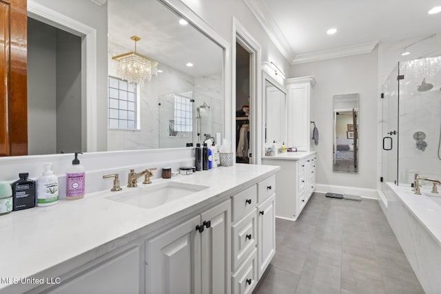 full bathroom with crown molding, a marble finish shower, recessed lighting, two vanities, and a sink