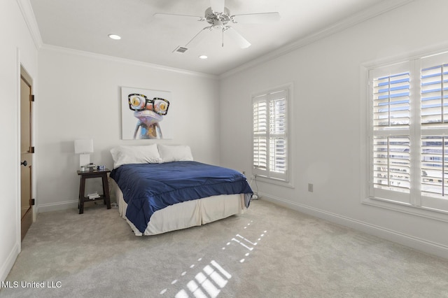 carpeted bedroom with baseboards, visible vents, and ornamental molding