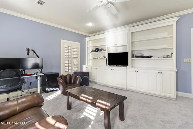 living room featuring ceiling fan, light carpet, visible vents, baseboards, and ornamental molding