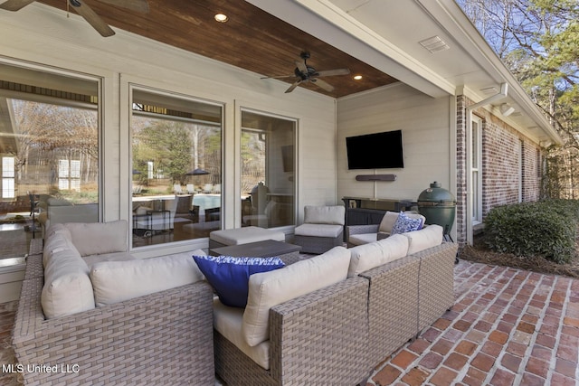 view of patio / terrace with ceiling fan, visible vents, and an outdoor living space