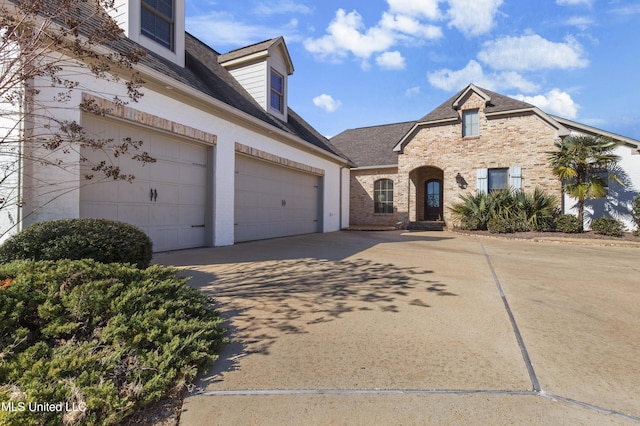 view of front of property featuring a garage