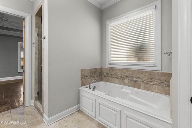 bathroom with ornamental molding, shower with separate bathtub, and a wealth of natural light