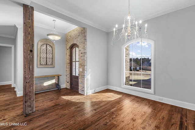 unfurnished dining area with crown molding and wood-type flooring