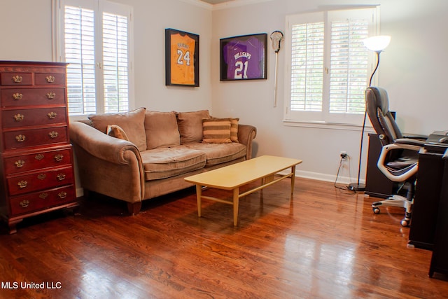 living room with baseboards and dark wood-style flooring