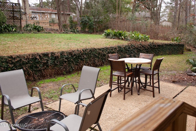 view of patio / terrace with outdoor dining area and fence