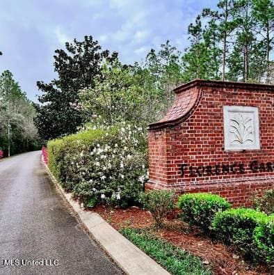 view of community sign